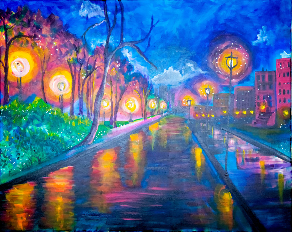 Painting, nighttime street scene with lamps lining an empty street on the right, and red buildings behind them. On the left of the street are trees and bushes. The lights reflect off the wet street in the middle of the painting.